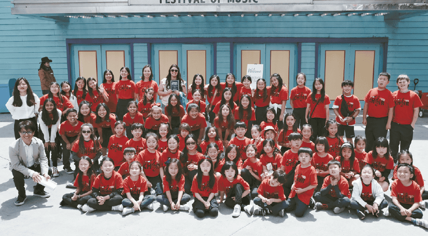 Laguna Road Choir competition winners pose after Knott’s music festival performance