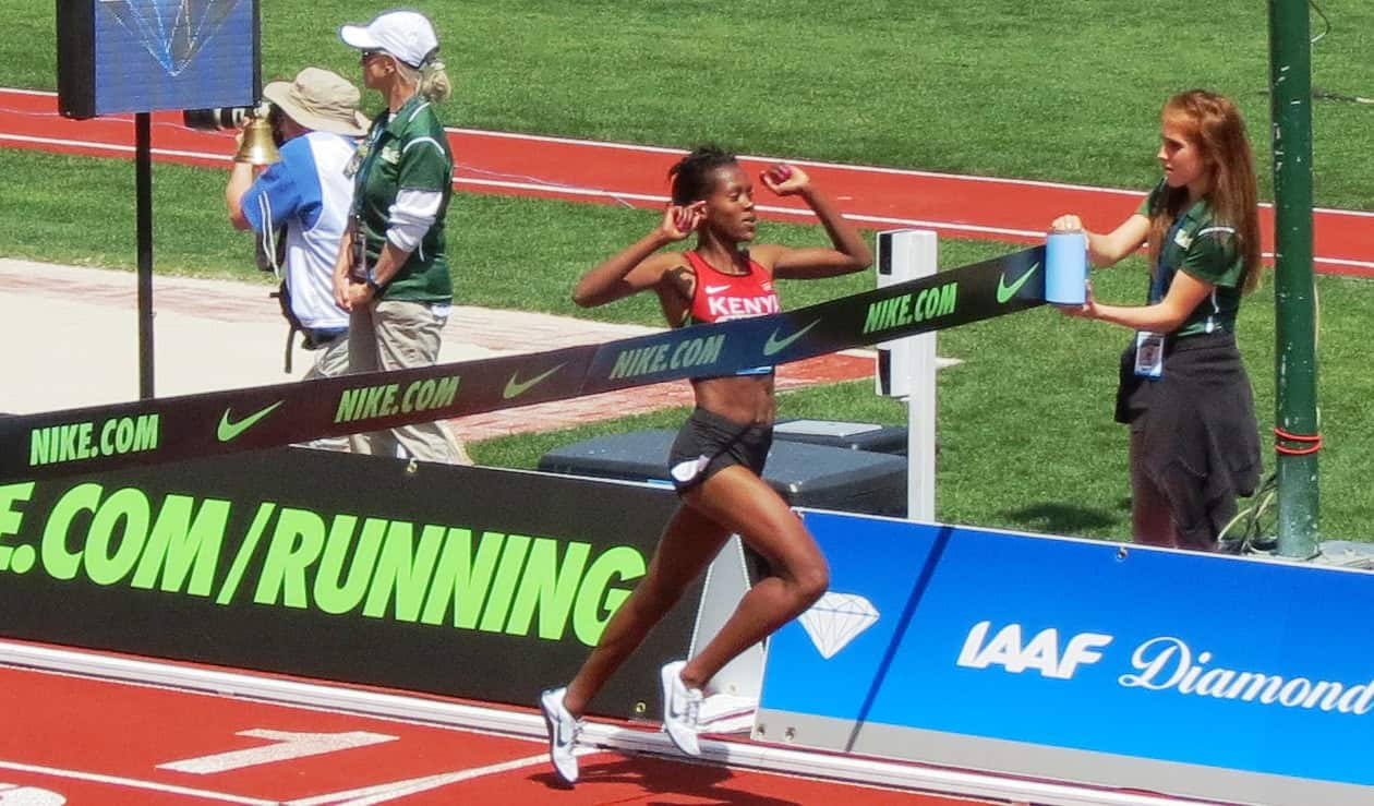 PHOTO: Faith Kipyegon of Kenya breaks the Kenyan 1500m record at the 2016 Prefontaine Classic in Eugene, Ore., running 3:56.41 (photo by David Monti for Race Results Weekly)