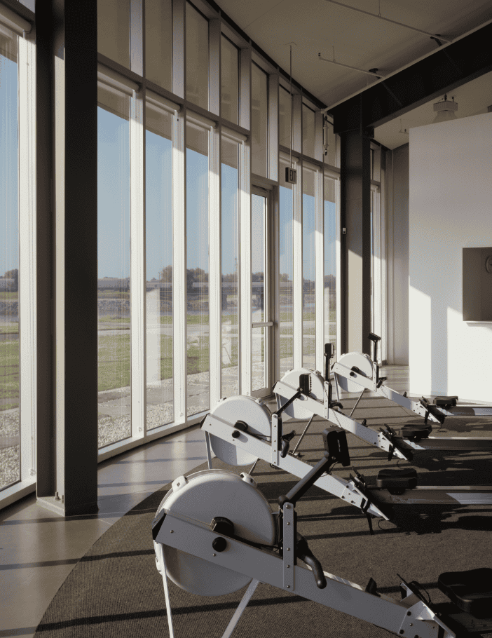 State-of-the-art workout facility inside the Chesapeake Boathouse with fitness equipment.