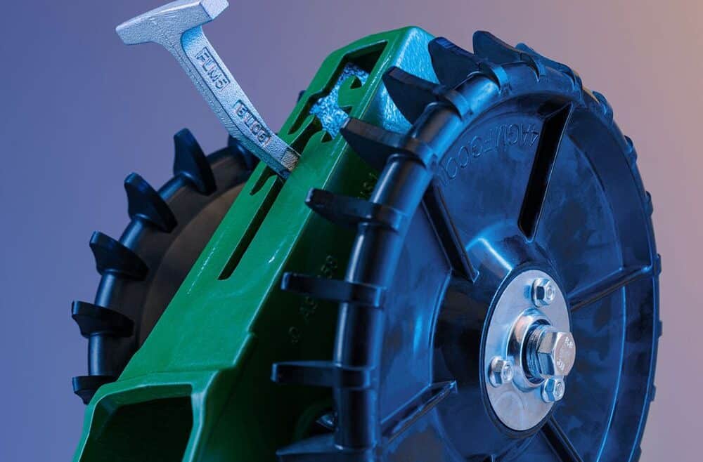How Do You Choose the Perfect Closing Wheels for Your Planter? Close-up of 4Ag closing wheel from a low side angle highlighting axle and wheel