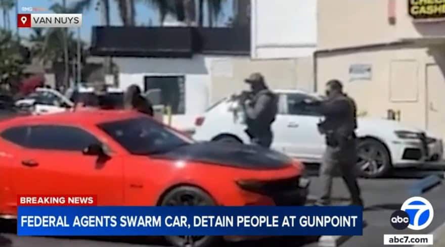 ICE raids in Van Nuys strip mall on September 9 with officers pointing rifles during enforcement