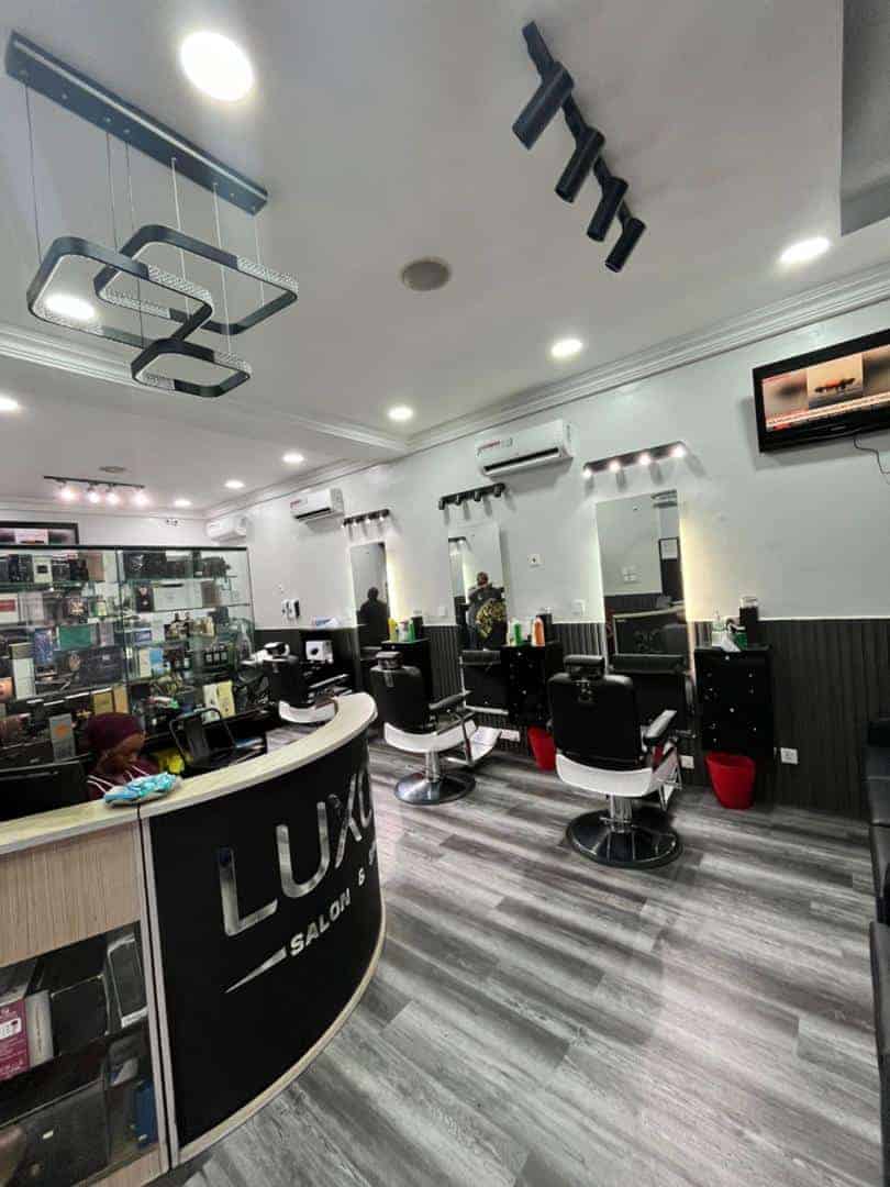 Modern hair salon interior with styling chairs and mirrors