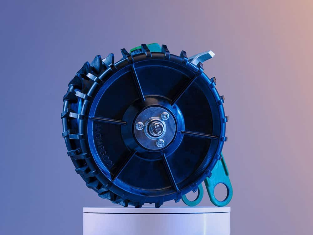 Close-up right angle of 4Ag planter closing wheel showing hardware bolts and wheel curve