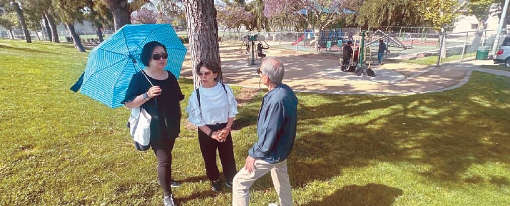 Korean seniors walk in the morning at Seoul International Park in Koreatown for safety instead of evening hours, highlighting the need for accessible green spaces.