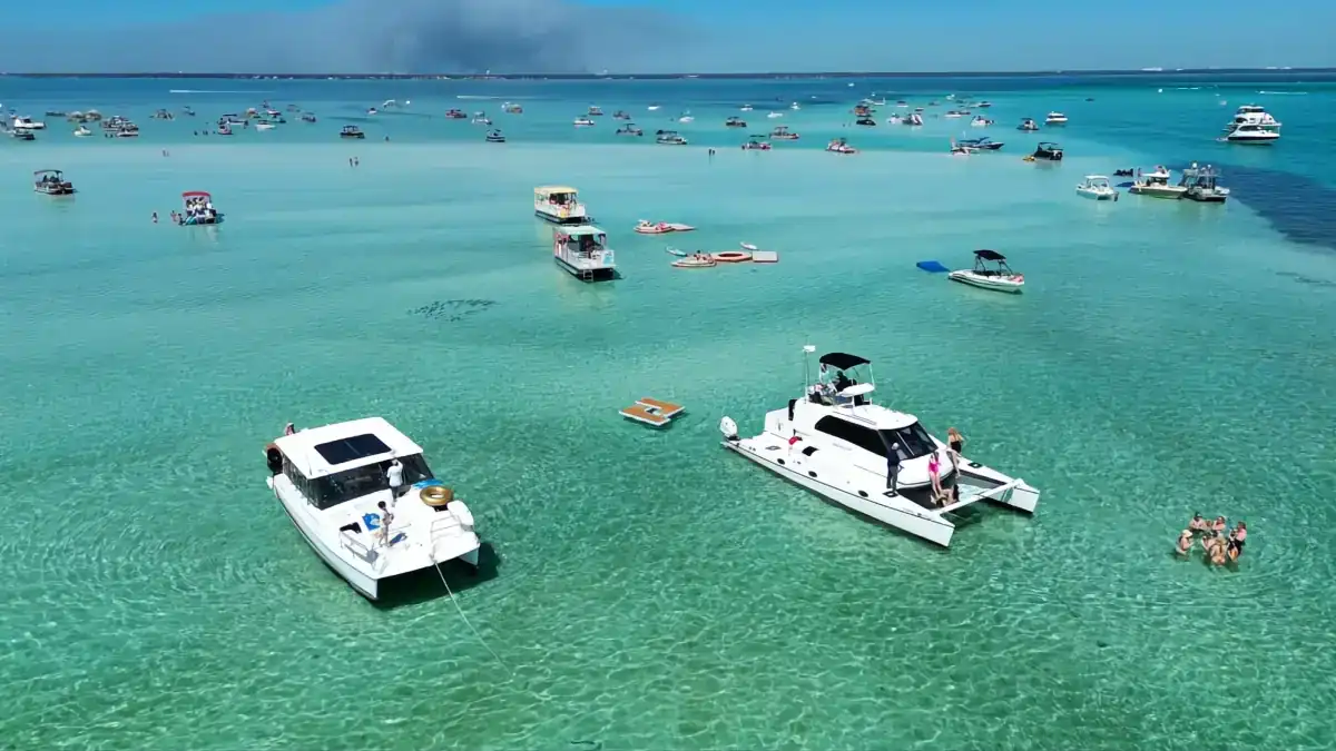 Two catamarans anchored at Crab Island