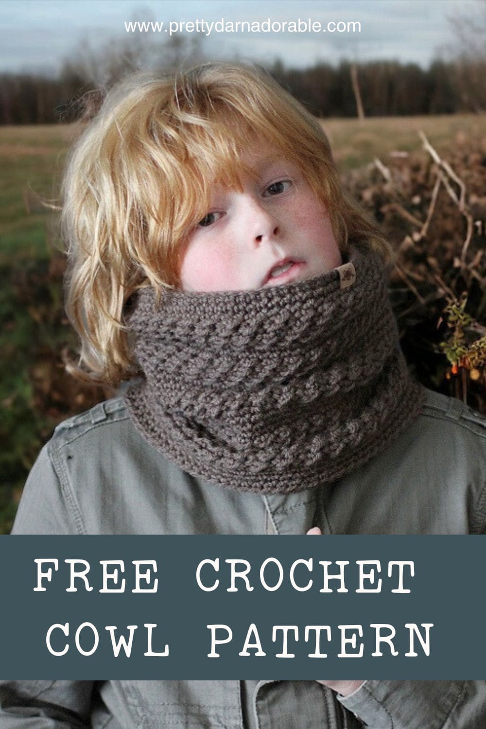 boy wearing a brown crochet cowl with alternating textures made out of worsted weight yarn