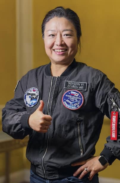 So-yeon Yi gives a thumbs-up after her Asian Hall of Fame induction, smiling confidently in Seattle