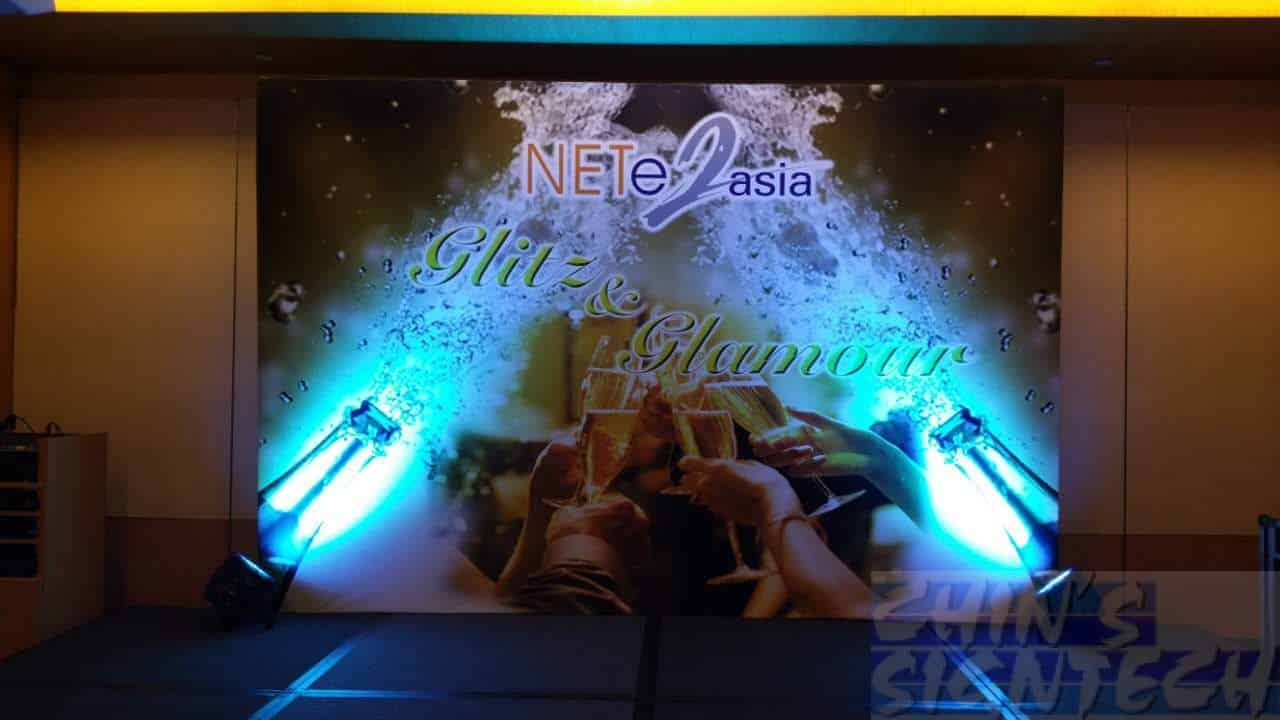 12 x 8ft event stage backdrop with champagne design when spotlights effect