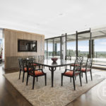 A living room filled with furniture and a table