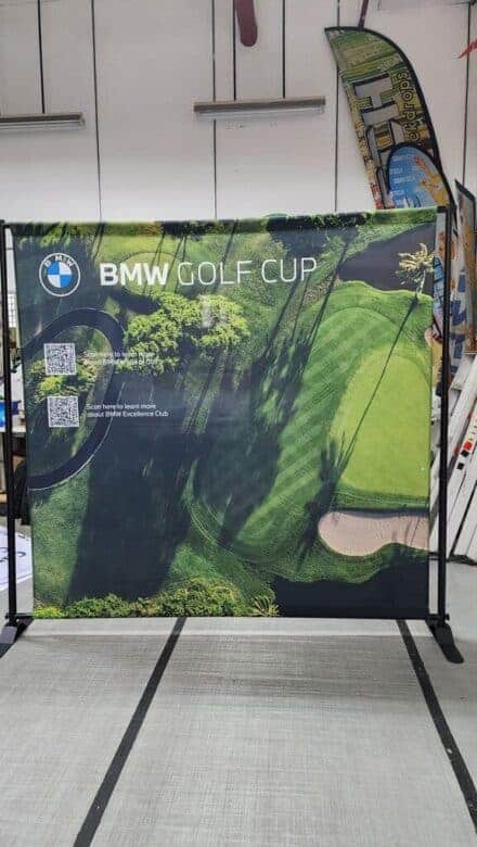 portable display installed with fabric poles on top and bottom