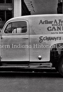 Fredrickson's Delivery Truck c. 1950s ph 6776 (Fredrickson) (1) Vintage delivery truck advertising Arthur A. Fredrickson wholesale candy and Schrafft's chocolates in Indiana, black and white historic photo.