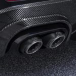 A bag of luggage sitting on top of a suitcase