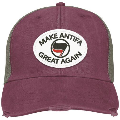 Maroon "Make Antifa Great Again" hat. This distressed Adams trucker cap features a vegan leather patch with the slogan and anti-fascist flag symbol.