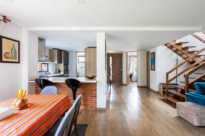 Large Sunny Open Living Dining Kitchen with Cork Floors