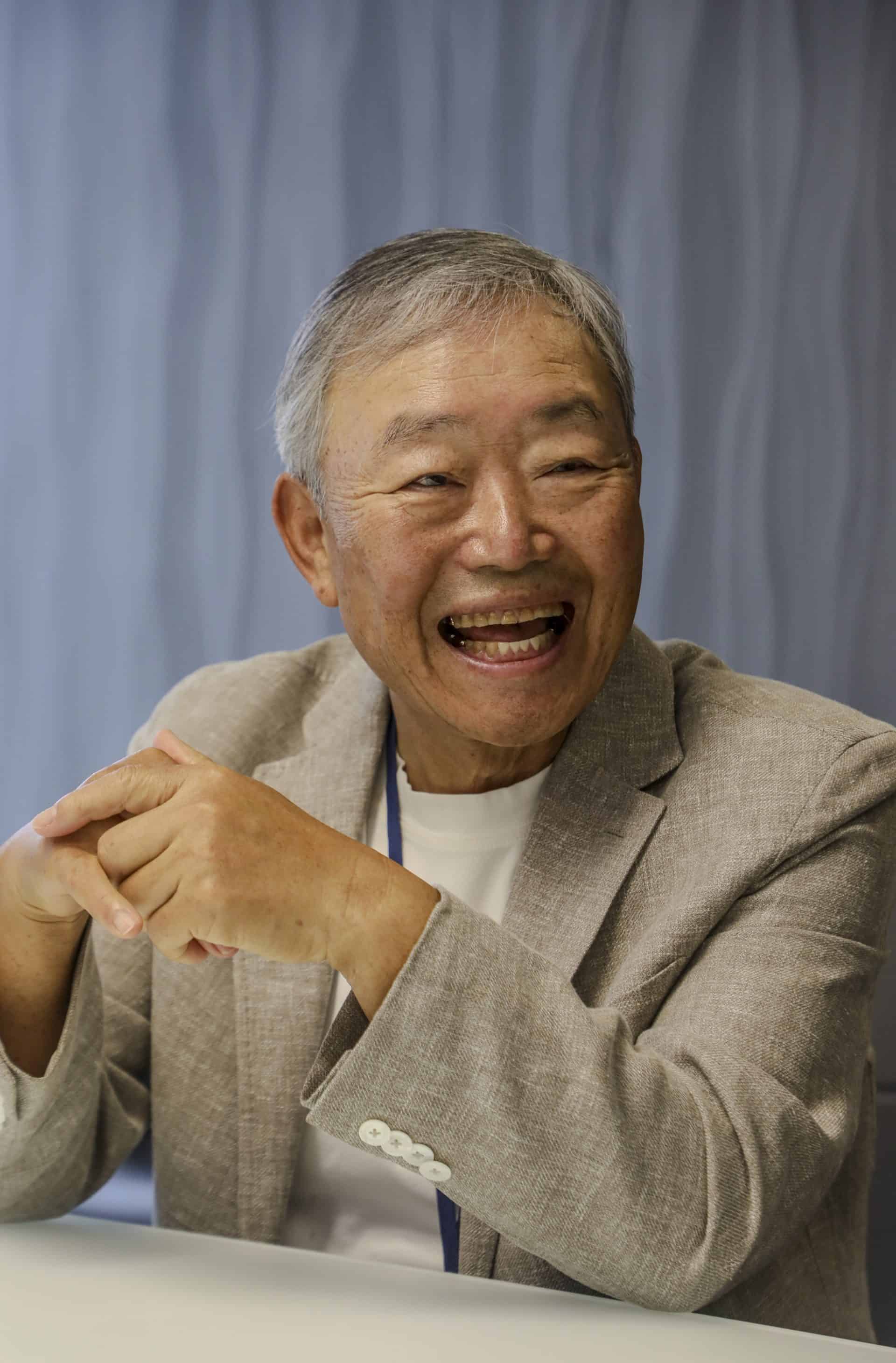 Brian Choi smiling during interview as Open Bank Chairman