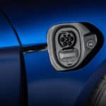A close up of a blue car