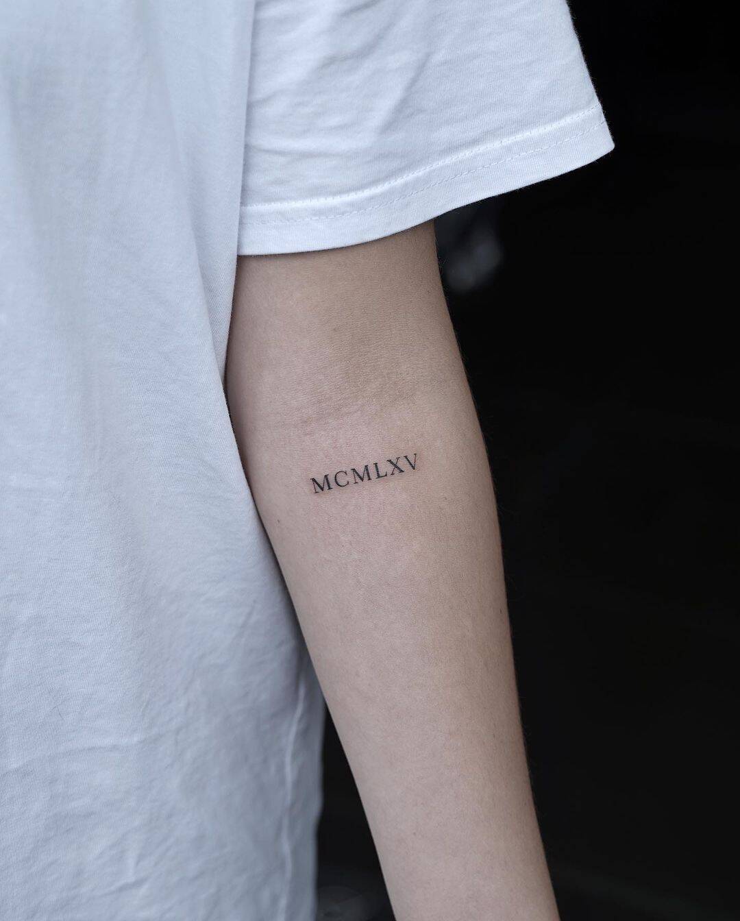 Fine Line Roman Numeral Tattoos: Minimal, Meaningful