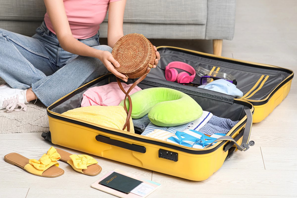 how to pack sweaters in a suitcase