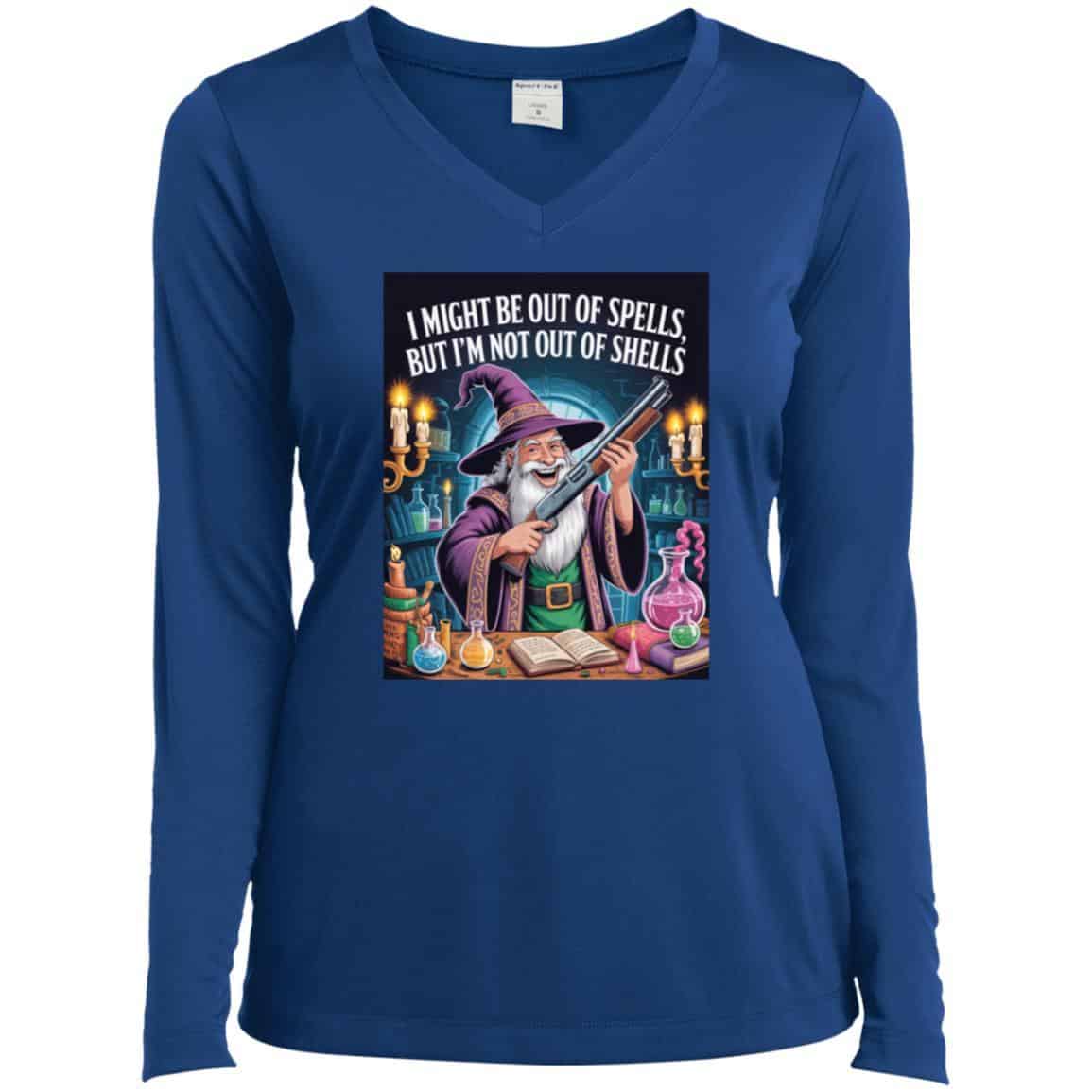 A woman models a royal blue long-sleeved V-neck tee featuring a wizard holding a shotgun amidst potions and spellbooks. The shirt reads: "I might be out of spells, but I'm not out of shells." A fun D&D gamer shirt!