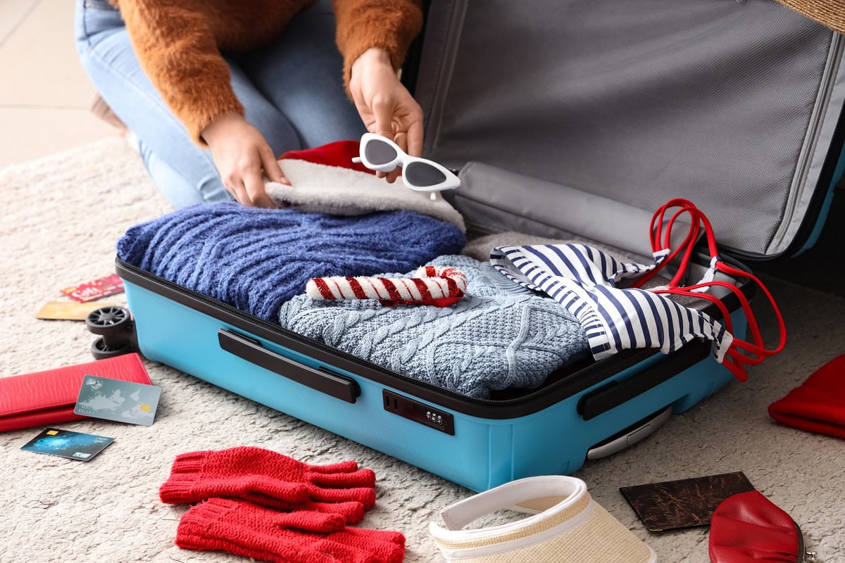 how to pack sweaters in a suitcase