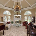 A living room filled with furniture and a fire place