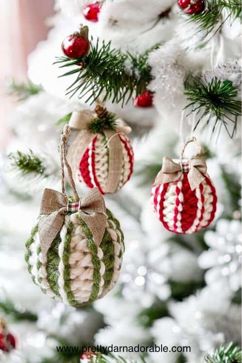 3 christmas ornament hanging from a tree