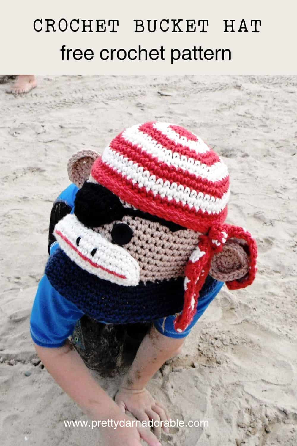 crochet bucket hat that looks like a pirate sock monkey made from red white and blue the monkey has an eye patch too. Free crochet bucket hat pattern.