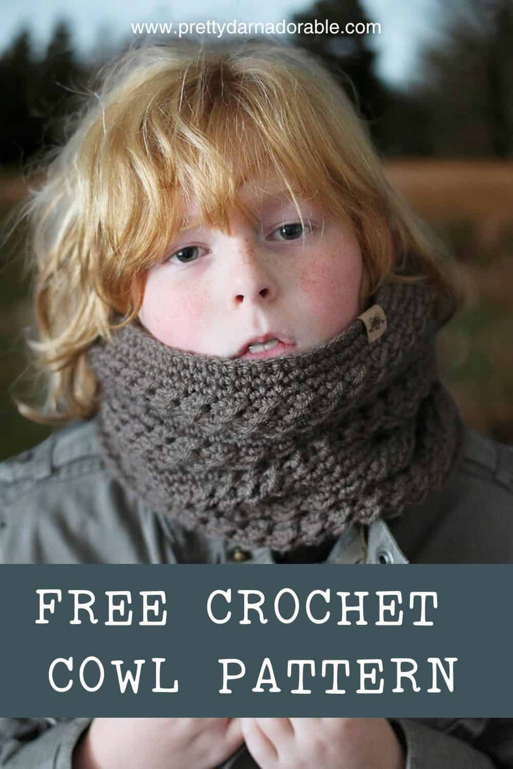 boy wearing a brown crochet cowl with alternating textures made out of worsted weight yarn