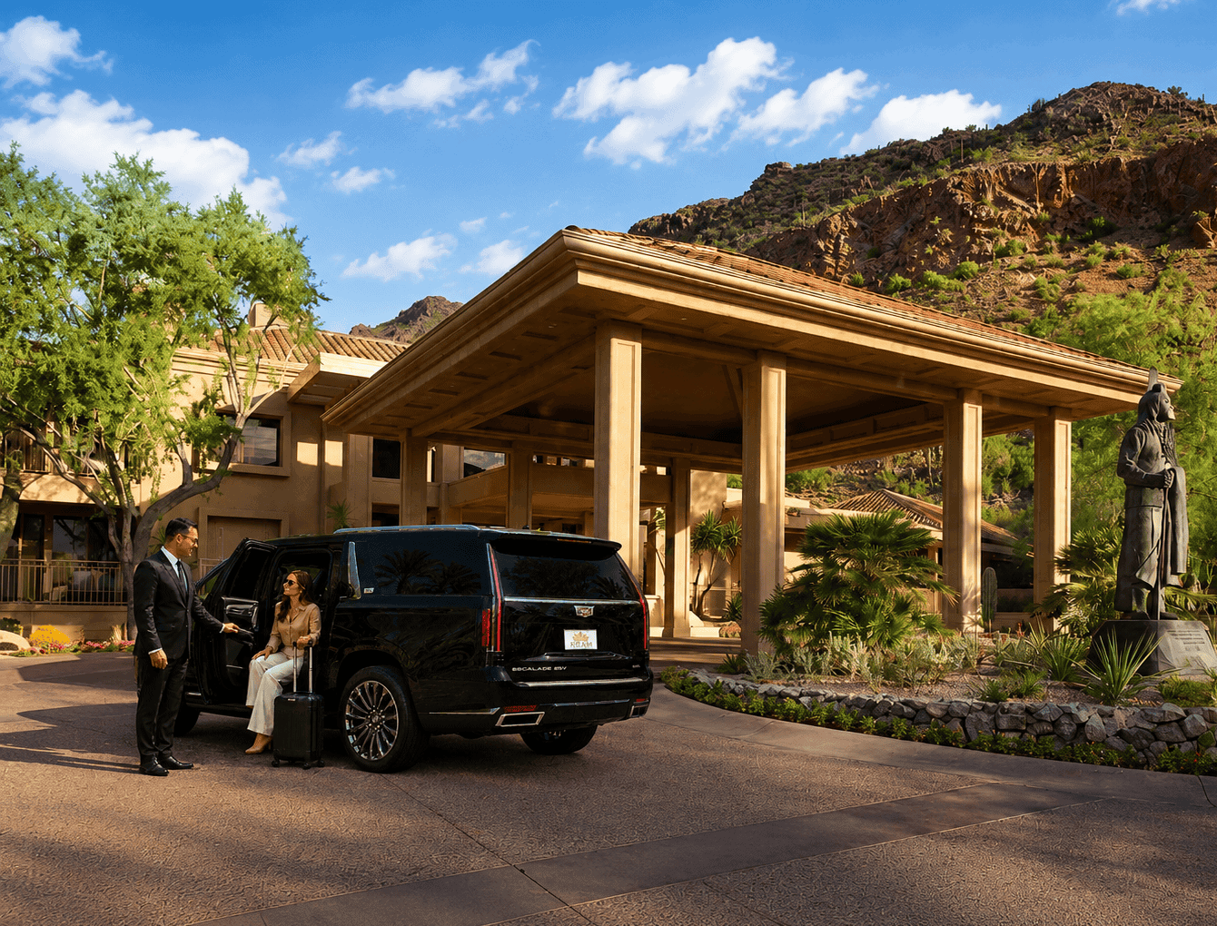 executive-transportation-phoenix-scottsdale-chauffeur-service Executive transportation service in Phoenix and Scottsdale with chauffeur assisting a business traveler from a luxury SUV at a Scottsdale resort