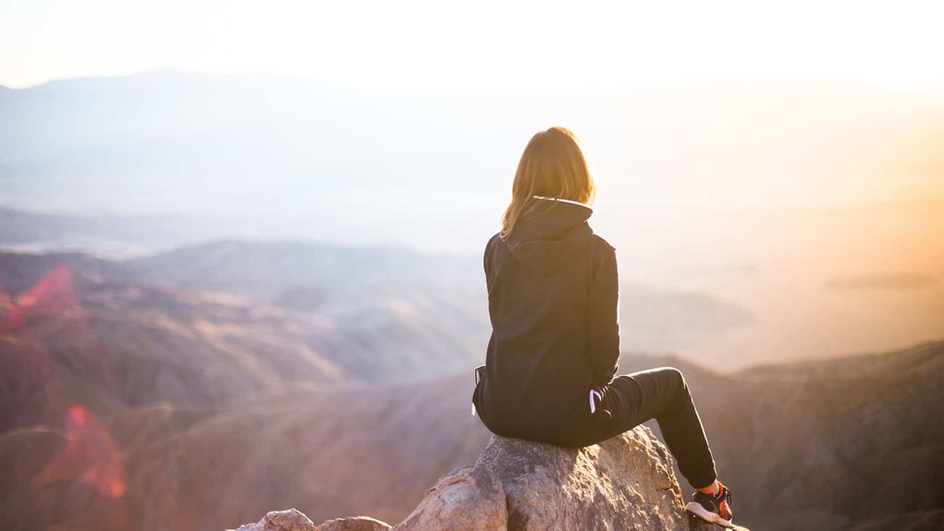 Image of a female traveller enjoying slow travel
