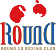 Introducing the emblem of Round 10 Boxing Club, where precision meets passion. Our distinguished logo showcases a striking pair of red boxing gloves, symbolizing strength and honor, poised above our name in dynamic blue and red typography. At Round 10, we are proud to highlight our exceptional Kids Boxing programs—designed to nurture young talent with professional guidance in a supportive environment. Join us at the heart of Dubai’s premier boxing community and let your child’s journey begin with the champions of tomorrow.