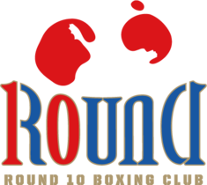 Introducing the emblem of Round 10 Boxing Club, where precision meets passion. Our distinguished logo showcases a striking pair of red boxing gloves, symbolizing strength and honor, poised above our name in dynamic blue and red typography. At Round 10, we are proud to highlight our exceptional Kids Boxing programs—designed to nurture young talent with professional guidance in a supportive environment. Join us at the heart of Dubai’s premier boxing community and let your child’s journey begin with the champions of tomorrow., boxing coach dubai, boxing personal trainer