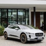 A car parked on the side of a building