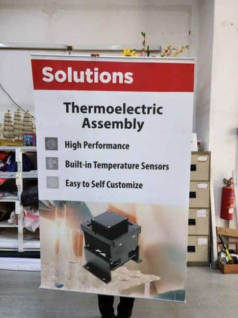 hanging posters on Exhibition-booth-panel