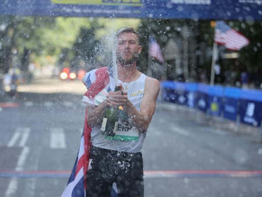 Kerr-Wins-the-Fifth-Avenue-Mile-Shattering-a-43-year-Record (2) On a sunny Sunday afternoon, Scotsman Josh Kerr of the Brooks Beasts Track Club set a new standard in American road racing. Kerr, the Olympic 1500m silver medalist, claimed victory at the 43rd New Balance Fifth Avenue Mile with an impressive time of 3:44.3, breaking Sydney Maree’s long-standing record from 1981 of 3:47.52.