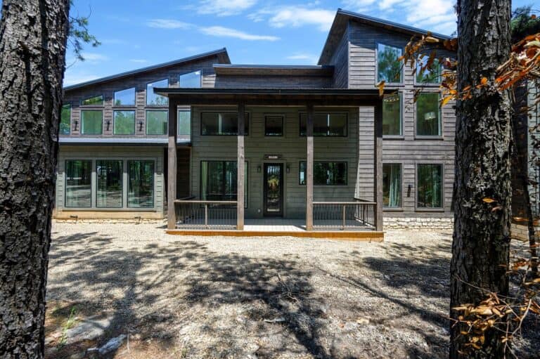 Modern pet friendly cabin exterior for stargazing vacations with an outdoor fire pit