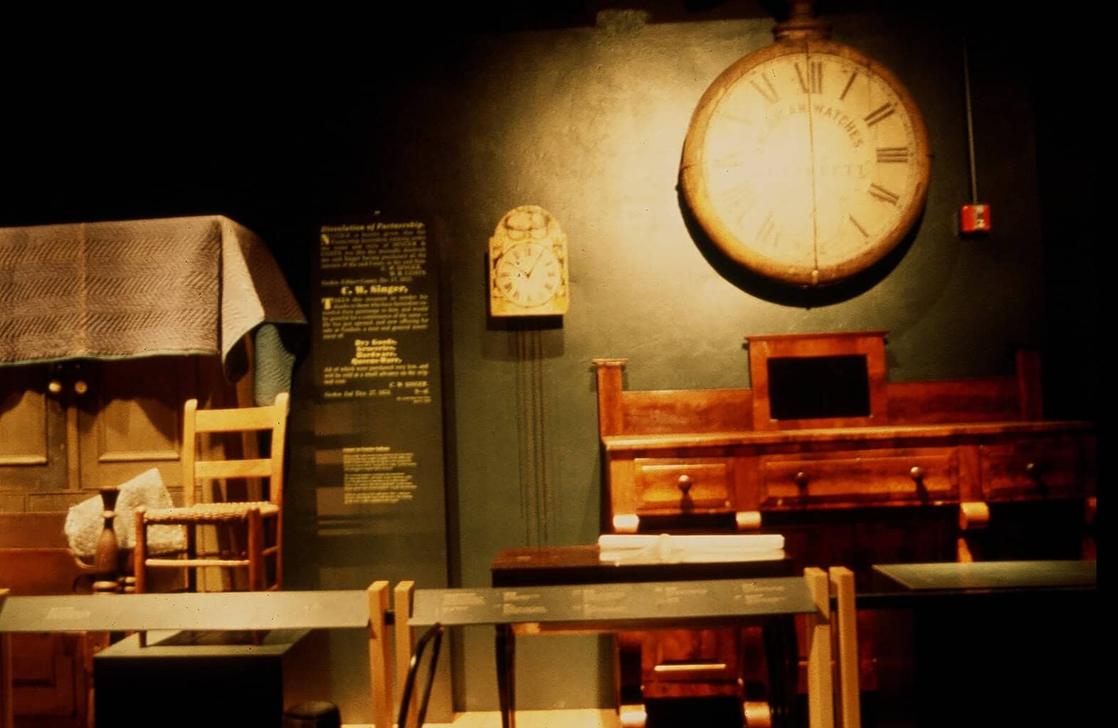 Using the Land large watch Vintage clocks and antique furniture at The History Museum exhibit.