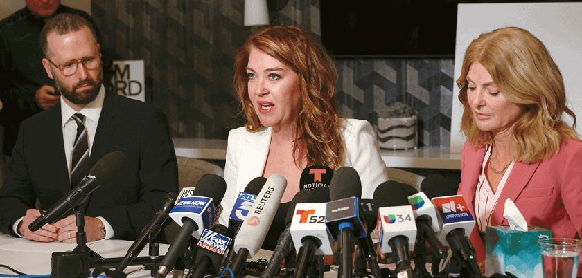 Lonna Drewes (center) holds a press conference with attorneys, alleging sexual assault by former Rep. Eric Swalwell.