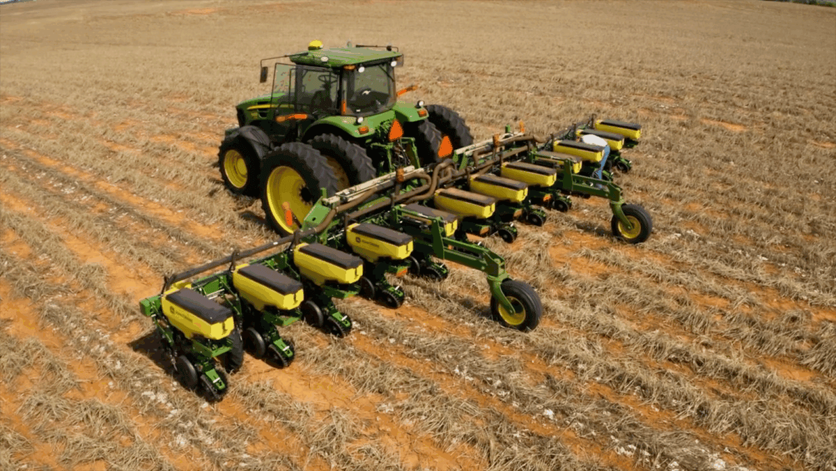 Aerial View of Tractor Using Cultivator Gauge Wheels for Uniform Soil Preparation