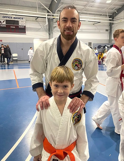 orange belt child in karate