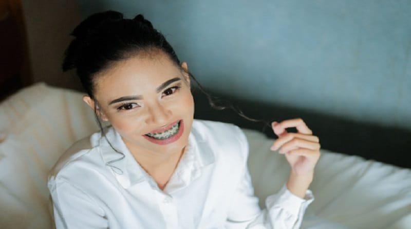 Smiling woman with braces -