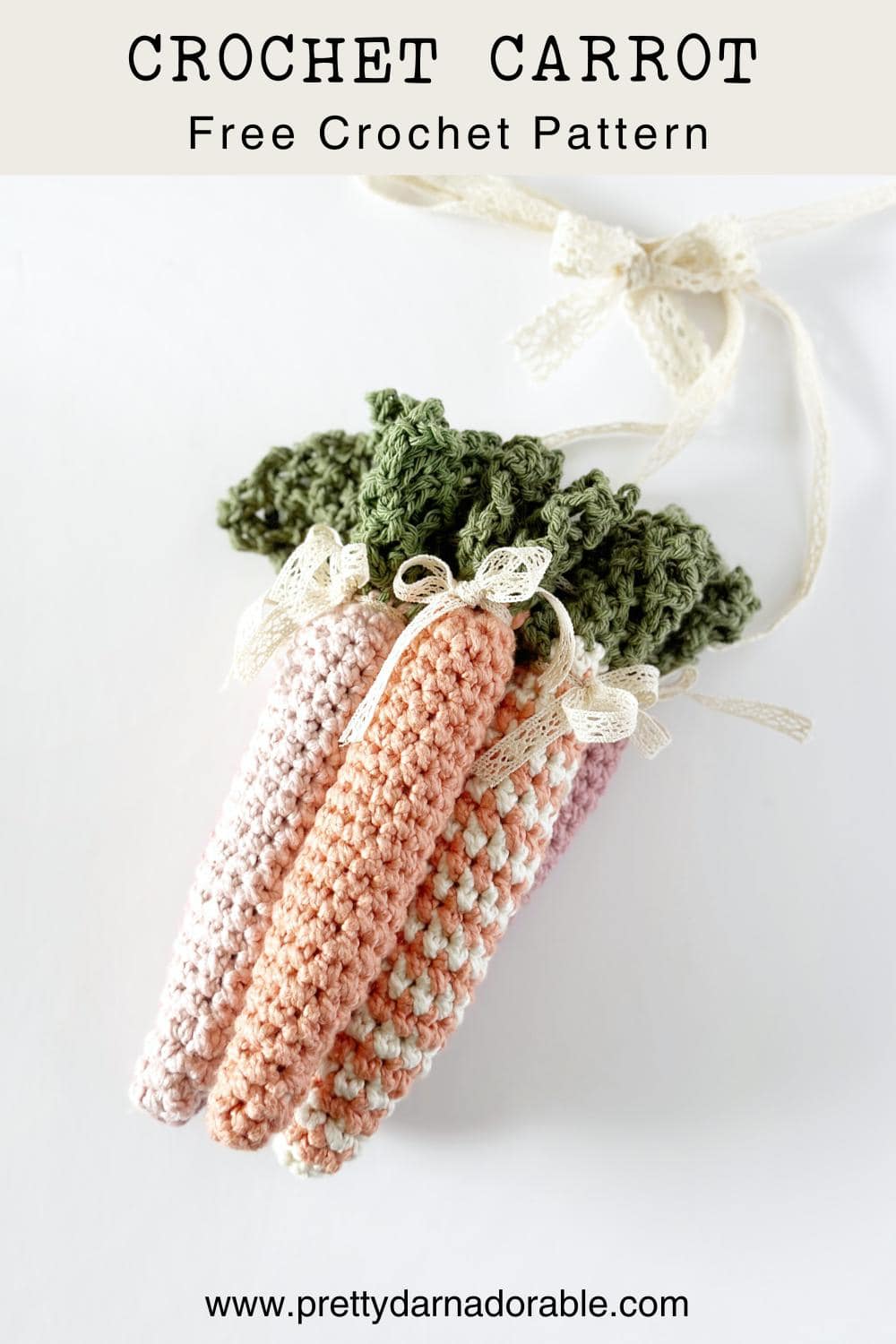 group of crochet carrots with green tops in solid and stripes