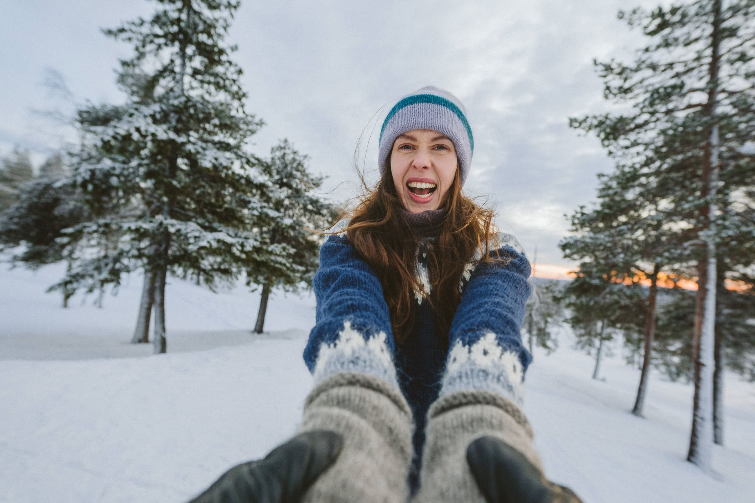 couple in wintery landscape Rovaniemi Lapland Finland