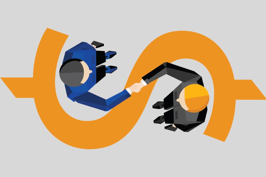 Two men shaking hands from a bird's eye view.