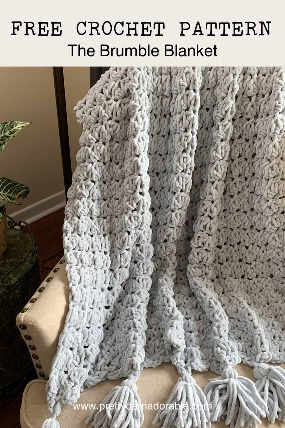grey crochet chunky blanket with tassels