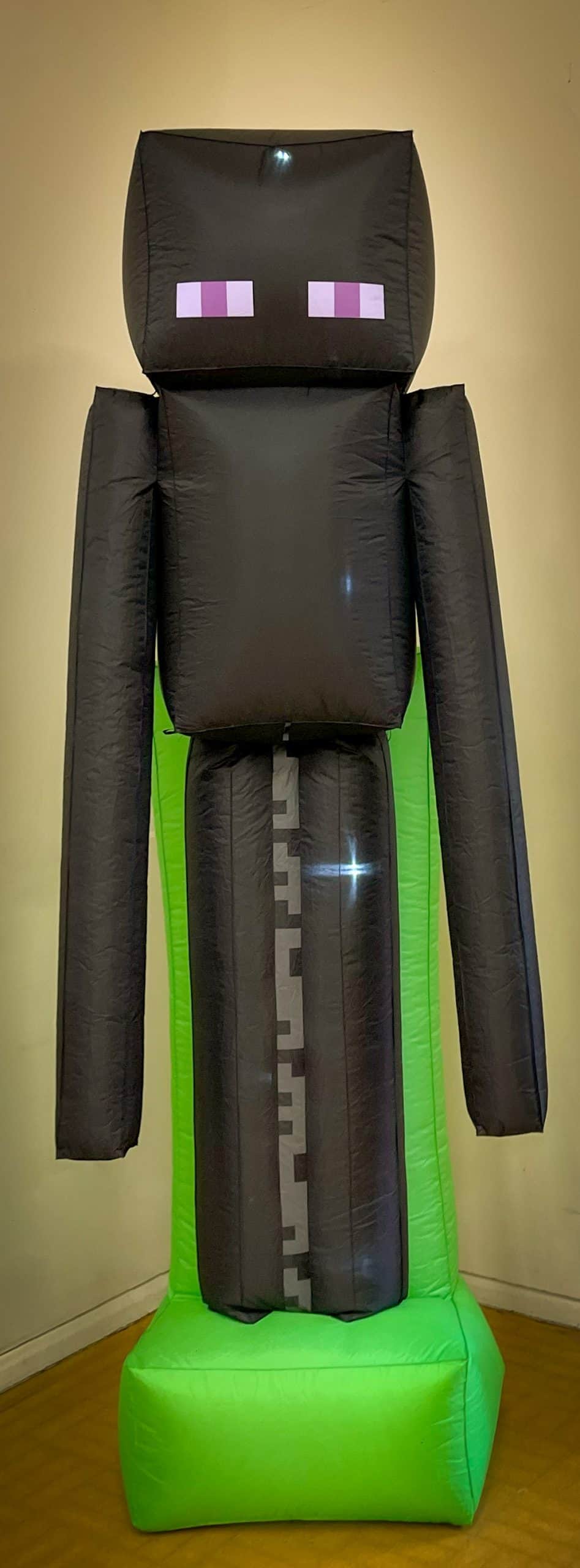 Minecraft Party Enderman Inflatable decorations 8ft illuminated Surrey Hampshire Berkshire - Childrens Party Entertainers | Surrey Hampshire and Berkshire | Treasure Box Parties Our giant Enderman stands eight feet tall and glows during the second‑half disco, thrilling up to 40 young Minecrafters.