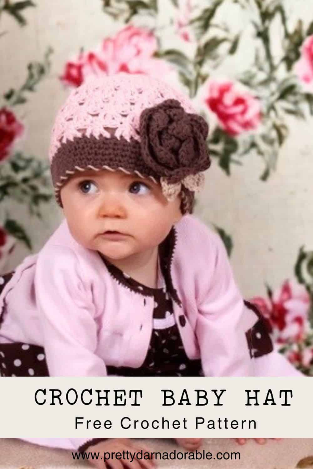 pink crochet beanie with brown trim and rose on a baby. free crochet baby hat pattern
