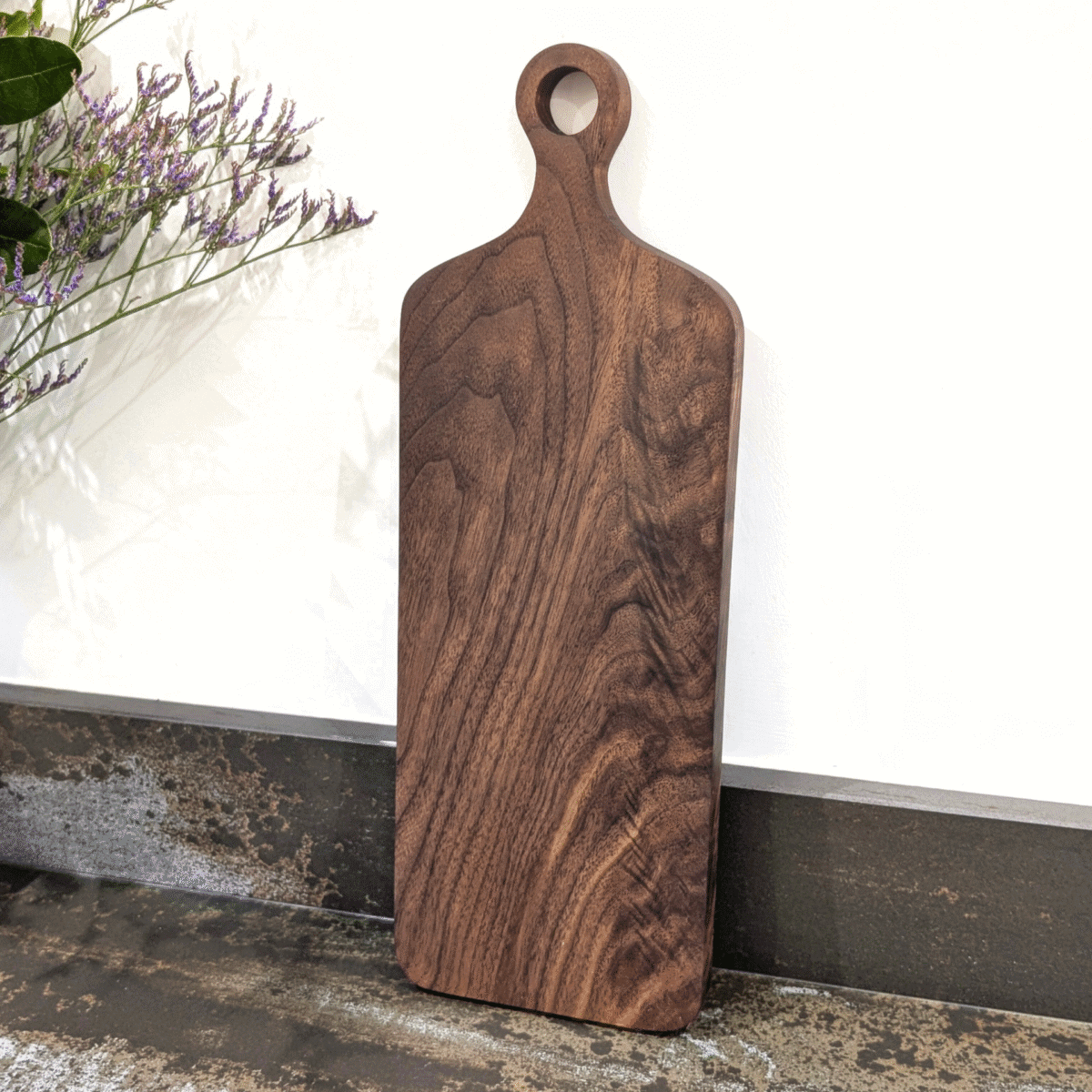 Solid Black Walnut Chopping Board - Angled image standing up