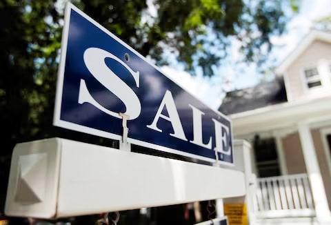 For sale sign in front of a house reflecting Koreatown real estate prices rise