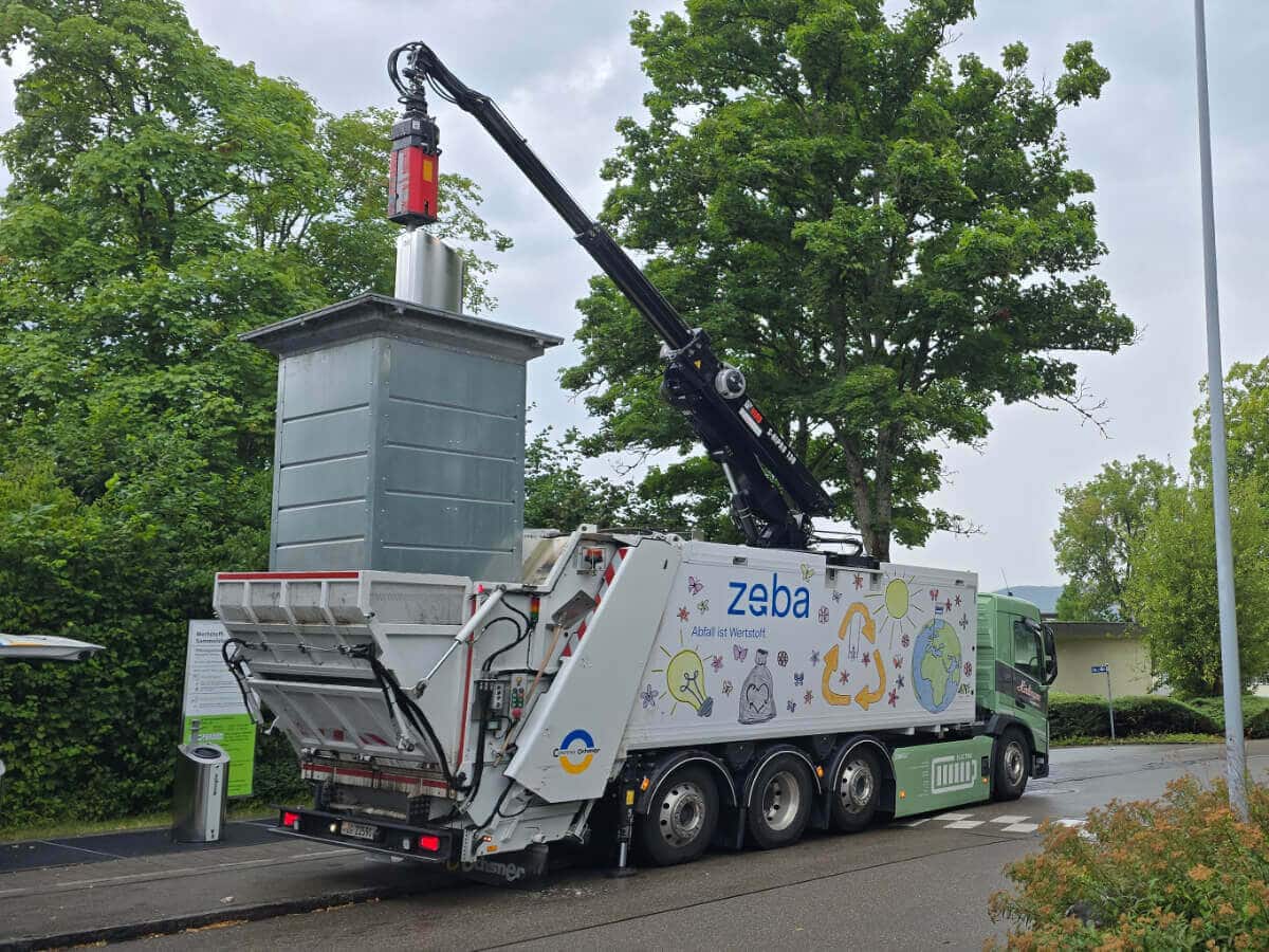 A garbage truck with a crane